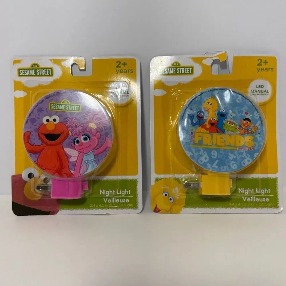 Lot of (2) Sesame Street LED Plug In Night Lights with Elmo and Abby Cadabby, an